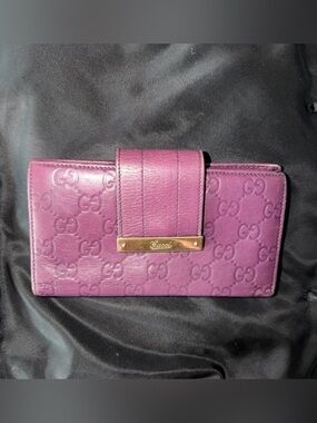 GUCCI Embossed GG Monogram Leather Wallet in Purple